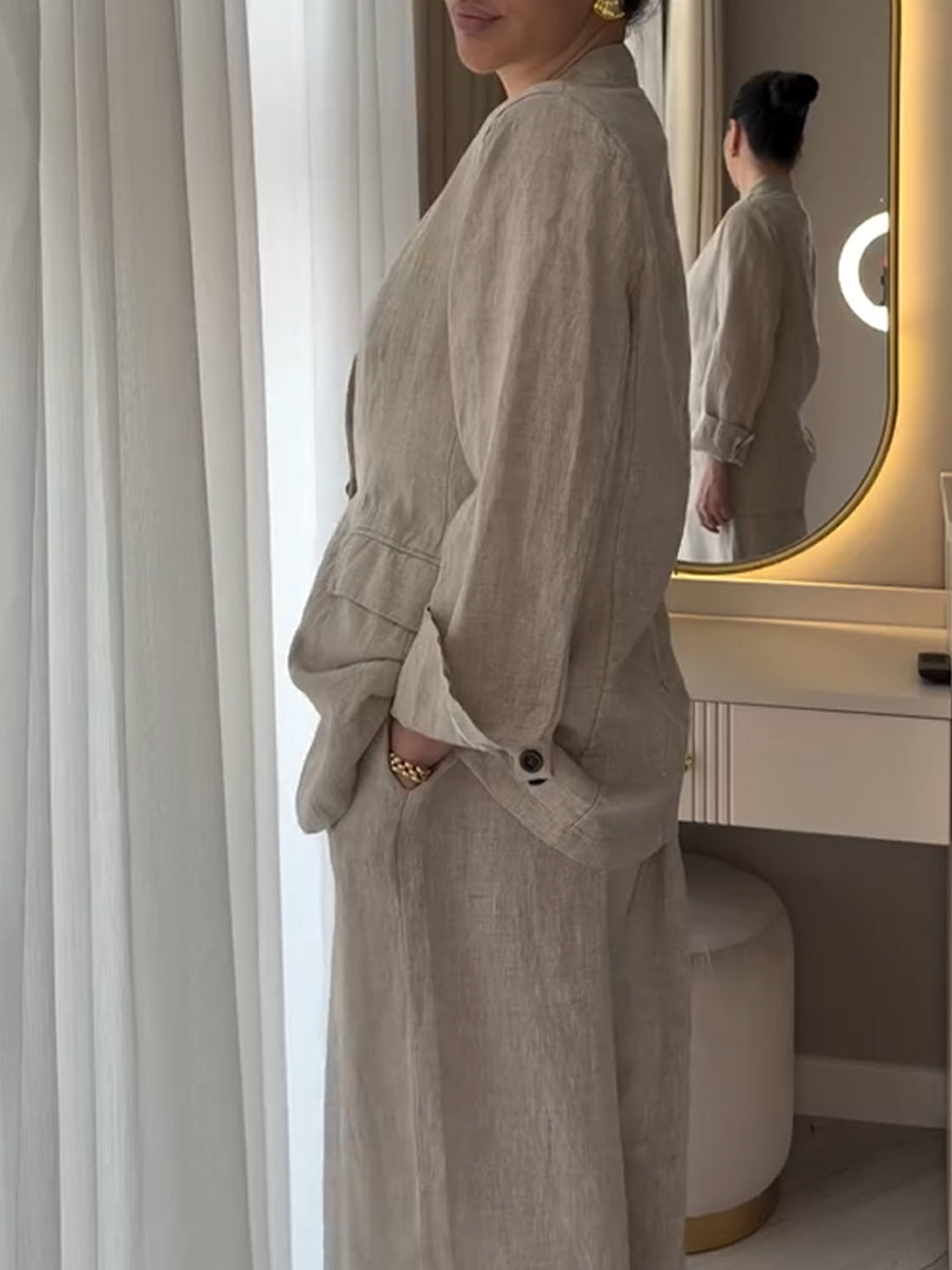 Two-piece Set Featuring A Casual Knit Cotton Top With Cut-out Details And Contrasting Color Trims, Paired With Linen-cotton Blend Trousers.