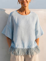 Solid-color Washed Linen Loose-fit Top Featuring A Round Neck, Ruffled Mid-length Sleeves, And A Tassel Hem—designed For A Relaxed, Flattering Fit