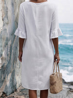 Solid-color Cotton Dress Featuring A V-neck, Three Wooden Buttons, Front Pleats, And Flattering Ruffled Mid-length Sleeves